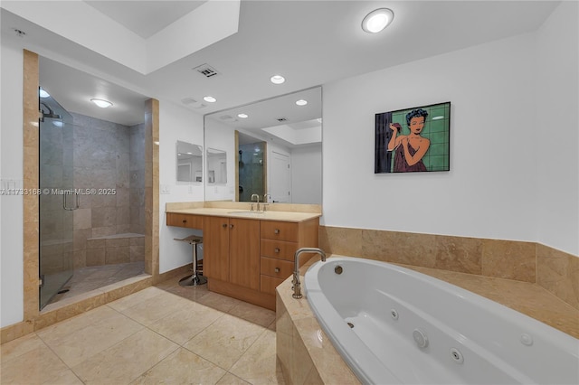 bathroom featuring vanity, separate shower and tub, and tile patterned floors