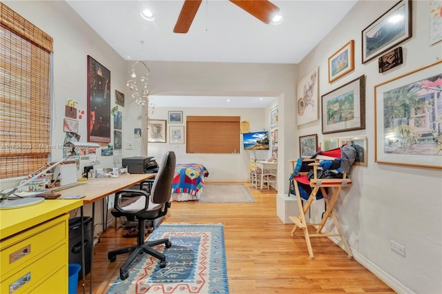 office space featuring light hardwood / wood-style flooring and ceiling fan