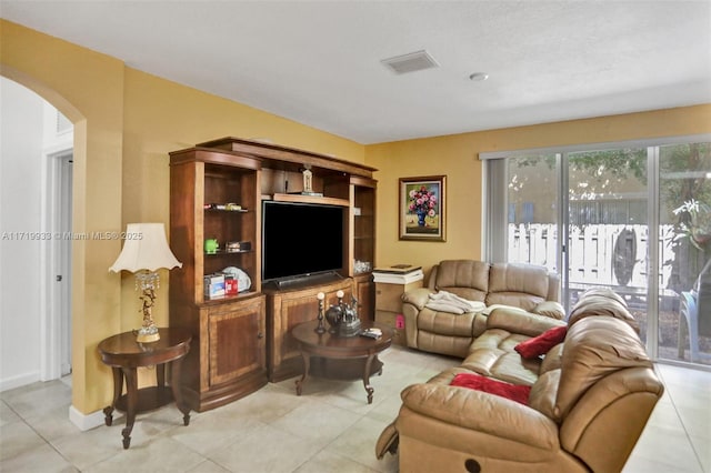 living room featuring light tile patterned floors