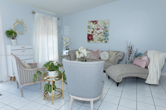 living area featuring light tile patterned flooring