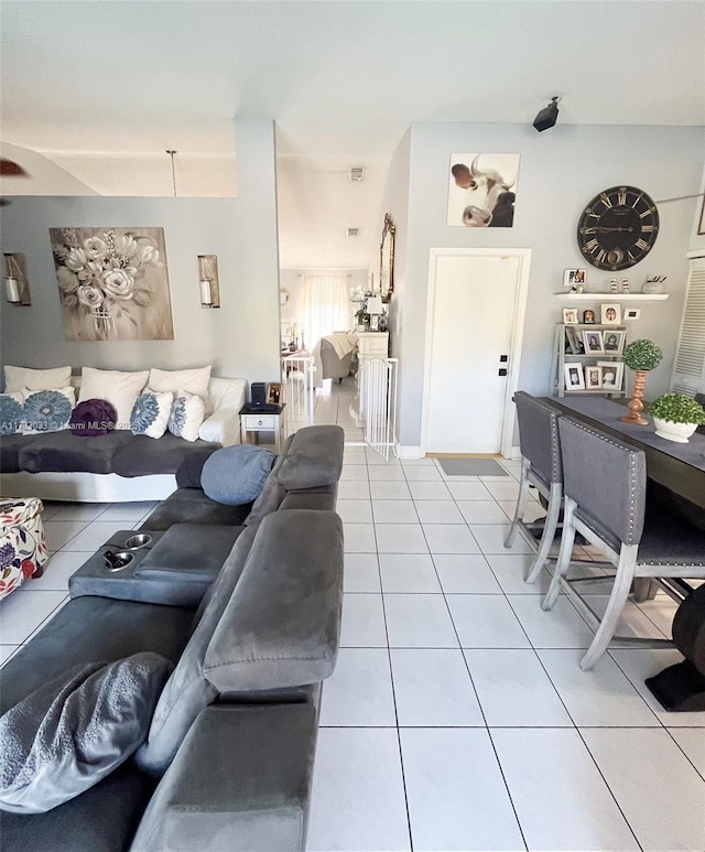 living room featuring light tile patterned floors