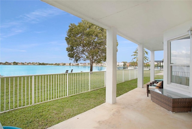 view of patio / terrace with a water view