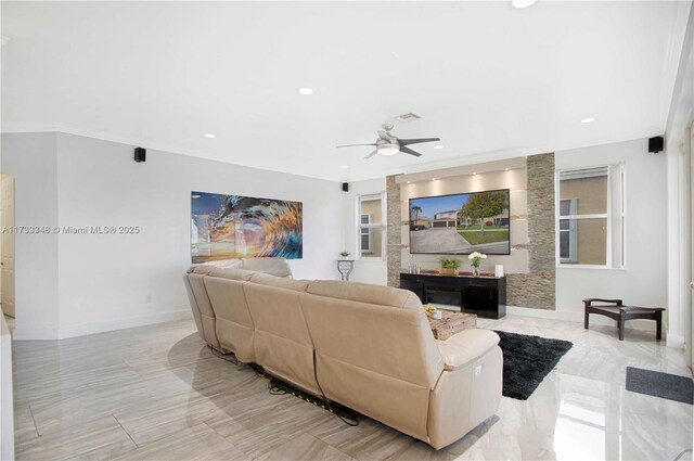 living room with hardwood / wood-style flooring and ceiling fan