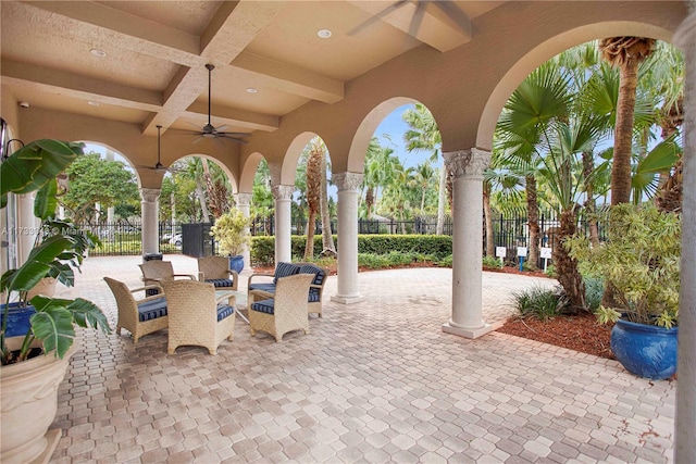 view of patio featuring ceiling fan