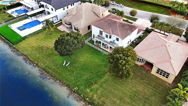 drone / aerial view with a water view