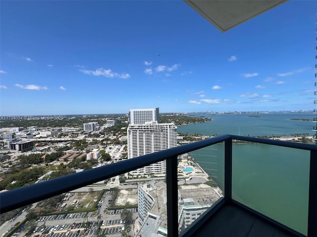 balcony featuring a water view