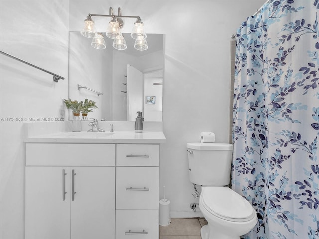 bathroom with vanity, a shower with shower curtain, tile patterned floors, and toilet