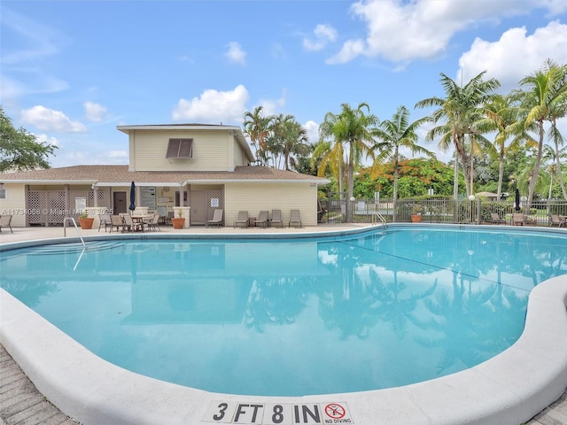 view of swimming pool featuring a patio