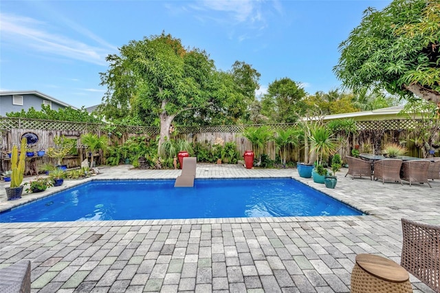 view of pool with a patio