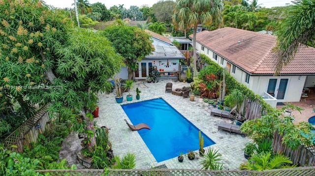 view of swimming pool featuring a patio