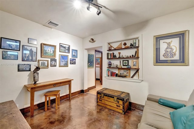 interior space featuring concrete floors