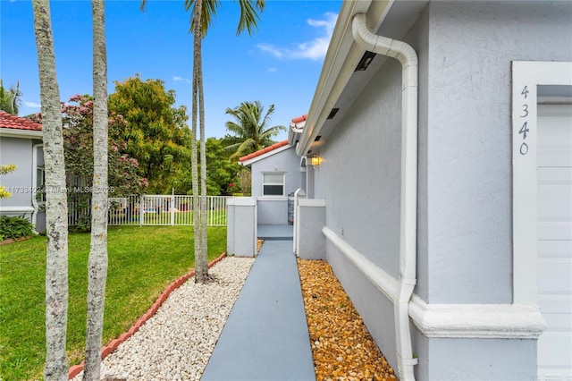 view of home's exterior featuring a yard