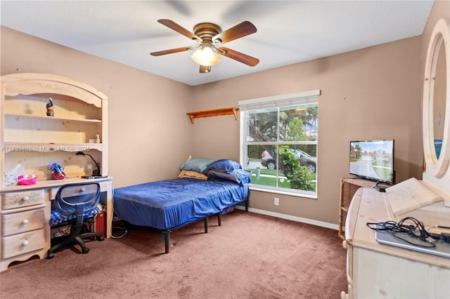 bedroom with ceiling fan and carpet flooring