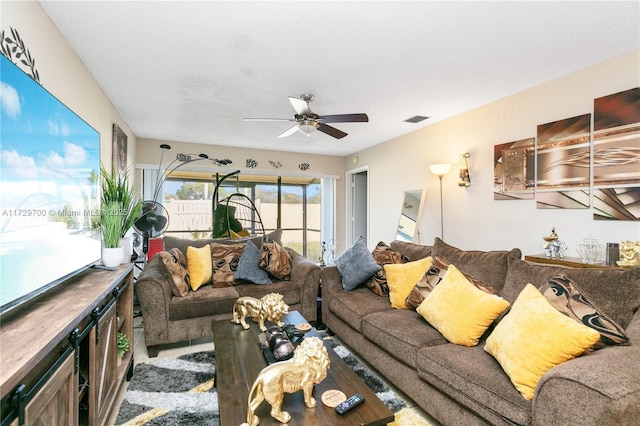 living room featuring ceiling fan