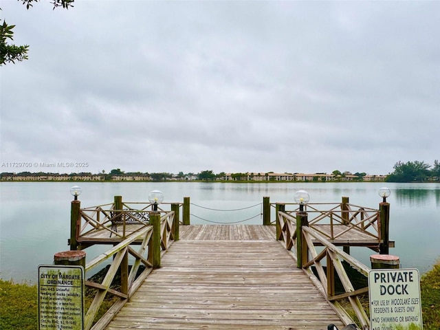 view of dock with a water view