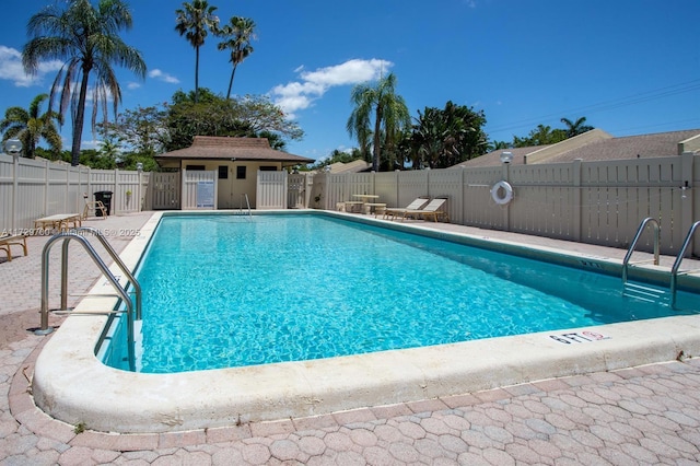 view of swimming pool featuring a patio