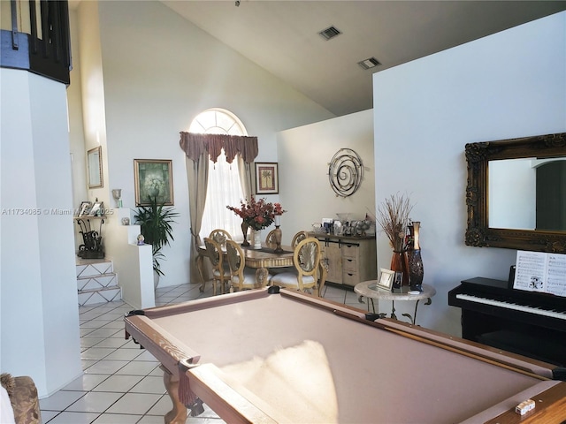 recreation room featuring pool table, high vaulted ceiling, and light tile patterned floors