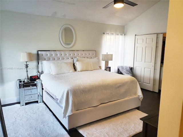 bedroom featuring lofted ceiling, hardwood / wood-style flooring, and ceiling fan