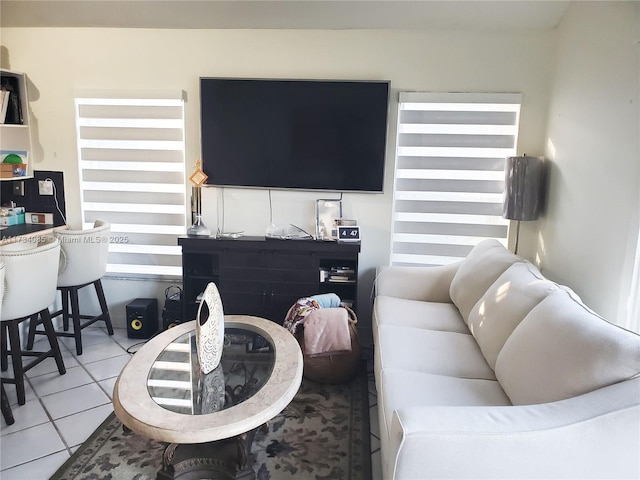 living room featuring light tile patterned flooring