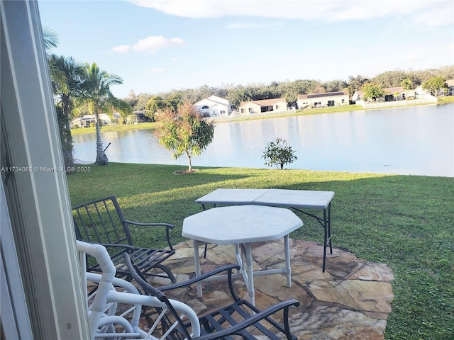 view of patio / terrace featuring a water view