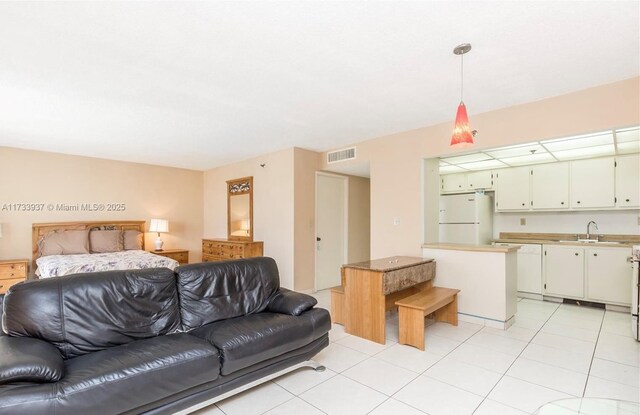 tiled living room with sink