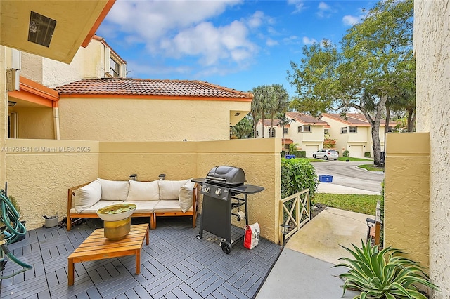 view of patio / terrace featuring grilling area and an outdoor living space