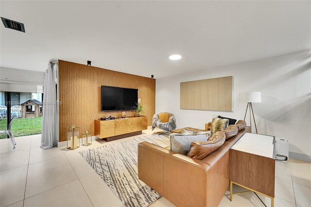 living room featuring wooden walls