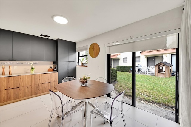 view of tiled dining space