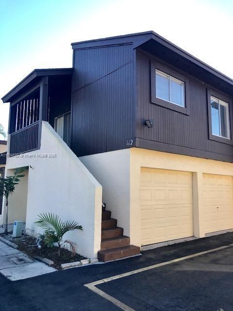 exterior space featuring a garage