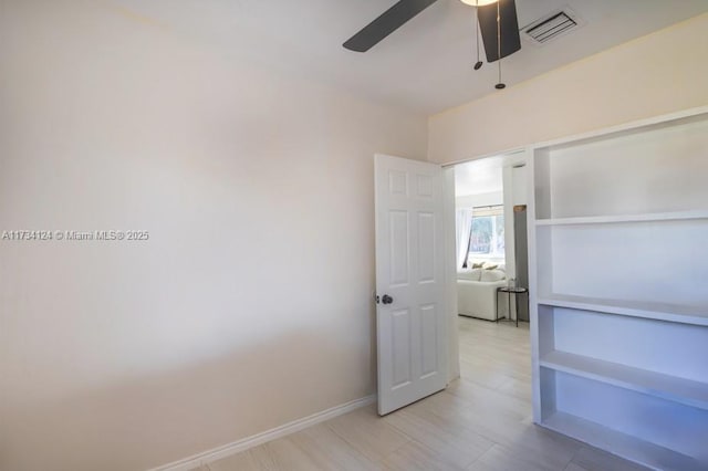 unfurnished bedroom with ceiling fan