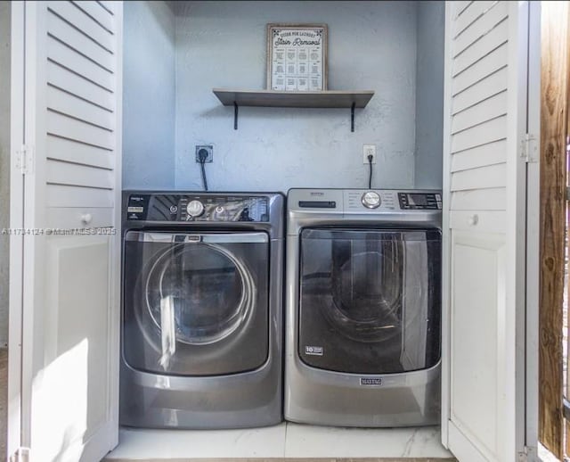 laundry area featuring independent washer and dryer