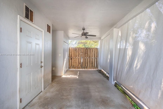 view of patio featuring ceiling fan