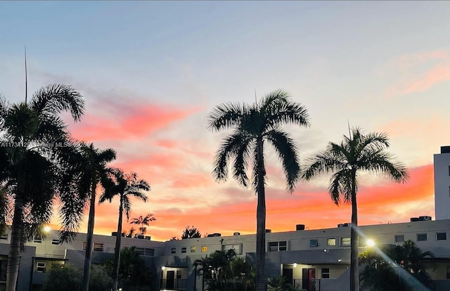 view of outdoor building at dusk