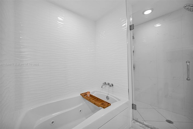 bathroom with shower with separate bathtub