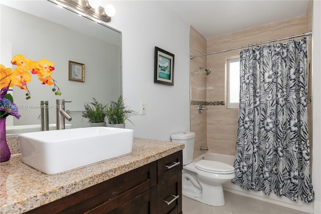 full bathroom with vanity, toilet, tile patterned flooring, and shower / bath combo with shower curtain