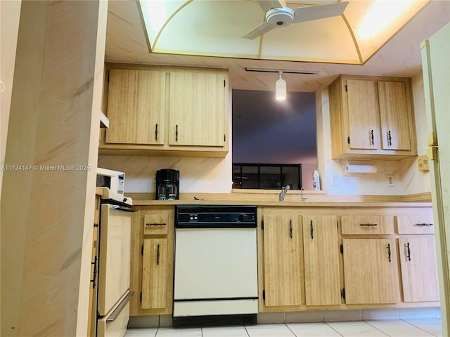 kitchen with rail lighting, hanging light fixtures, light tile patterned floors, white dishwasher, and light brown cabinets