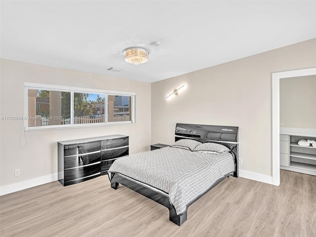 bedroom featuring light hardwood / wood-style flooring