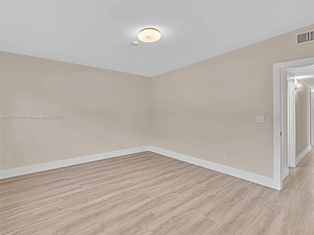 12904 Banyan Rd, North Miami, FL 33181 - empty room featuring light wood finished floors and baseboards