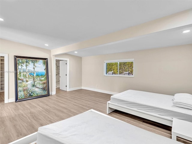 bedroom with wood-type flooring