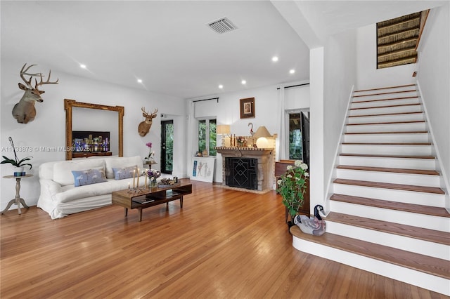 living room with light hardwood / wood-style flooring