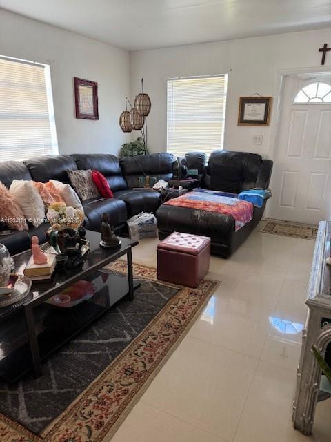 living room featuring tile patterned flooring