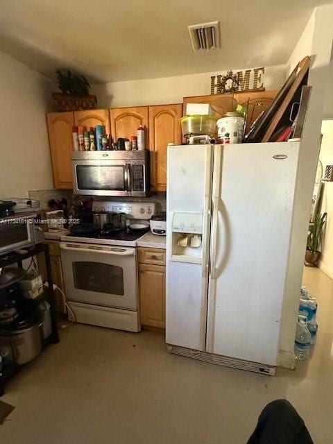 kitchen featuring white appliances