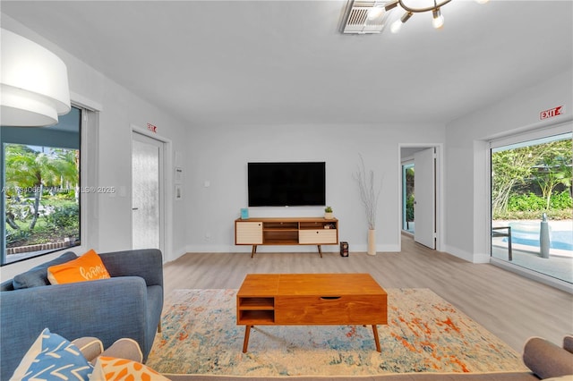 living room with hardwood / wood-style floors