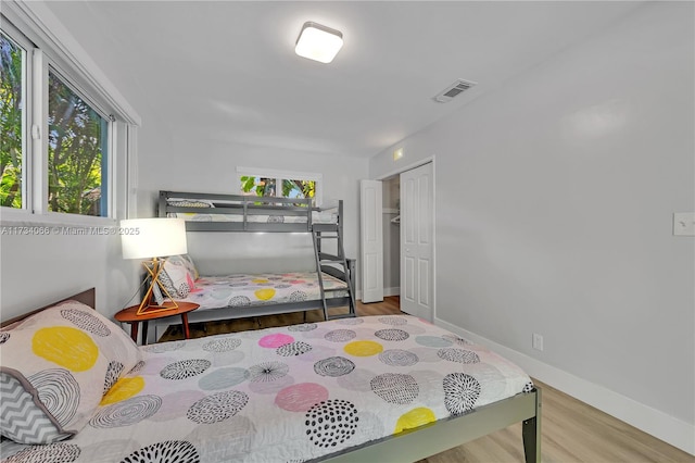 bedroom with wood-type flooring