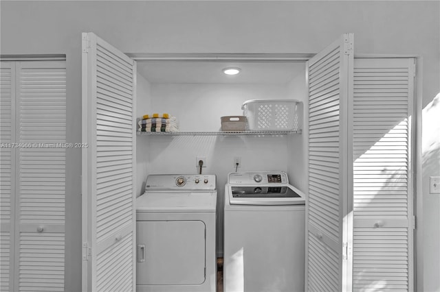 washroom featuring separate washer and dryer