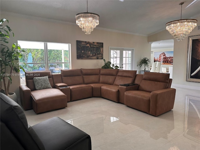 living room featuring ornamental molding, french doors, and a chandelier