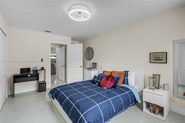 bedroom with a textured ceiling