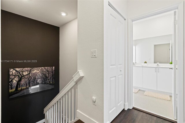 14823 SW 163rd Ter, Miami, FL 33187 - corridor featuring an upstairs landing, dark wood-style flooring, recessed lighting, and a sink