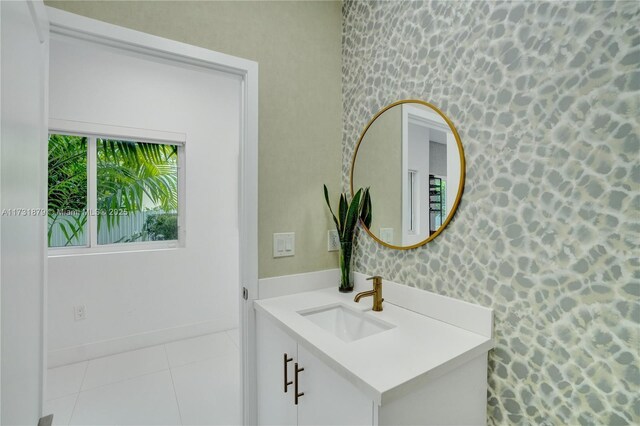 bathroom featuring vanity and tile patterned flooring