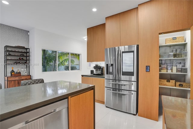 kitchen featuring stainless steel fridge with ice dispenser, light tile patterned floors, and beverage cooler